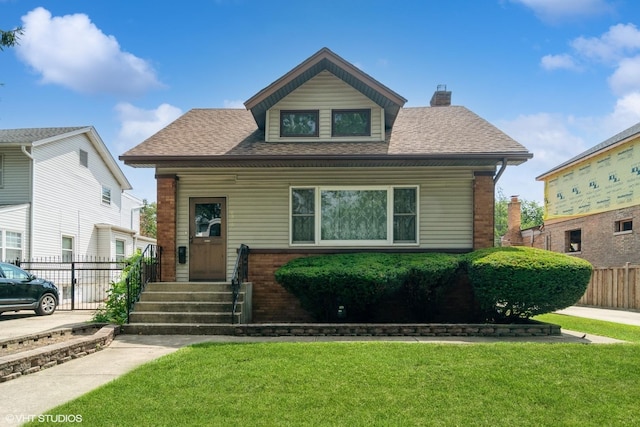 6919 N Overhill Ave, Chicago, IL 60631 - bungalow featuring a chimney and a shingled roof
