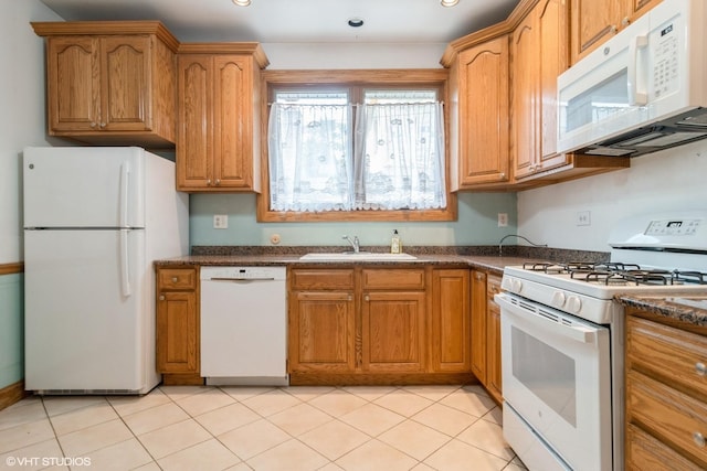6919 N Overhill Ave, Chicago, IL 60631 - kitchen with white appliances, brown cabinetry, recessed lighting, and dark stone counters