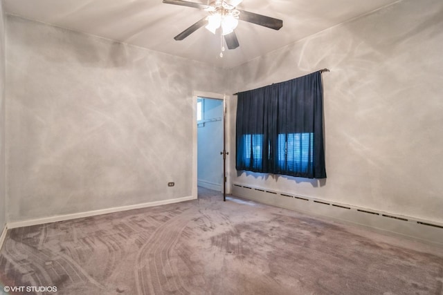 6919 N Overhill Ave, Chicago, IL 60631 - carpeted spare room with a baseboard heating unit and a ceiling fan
