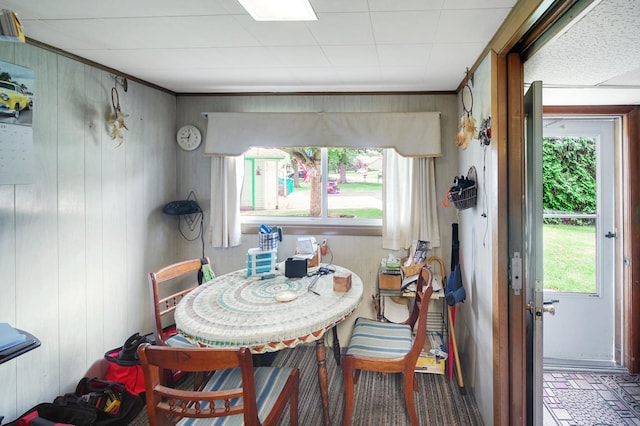 23761 N Cottage Rd, Lake Zurich, IL 60047 - dining area featuring wooden walls and brick patterned flooring