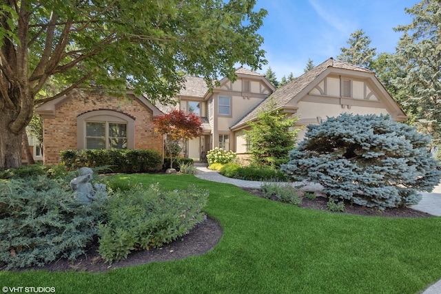 1806 Princeton Ct, Lake Forest, IL 60045 - tudor-style house featuring a front lawn and stucco siding