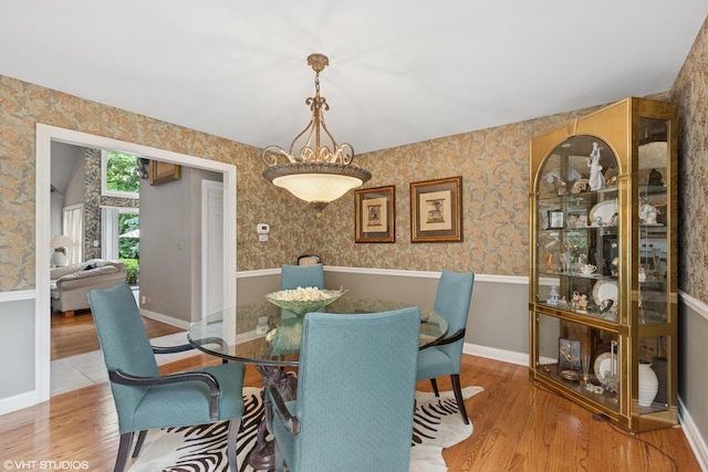 1806 Princeton Ct, Lake Forest, IL 60045 - dining room featuring wallpapered walls, wood finished floors, and wainscoting