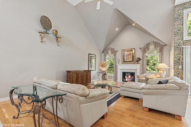 1806 Princeton Ct, Lake Forest, IL 60045 - living area with healthy amount of natural light, high vaulted ceiling, light wood-style floors, a glass covered fireplace, and recessed lighting