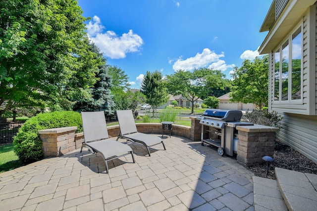 520 Meadowwood Ln, Oswego, IL 60543 - view of patio with a grill