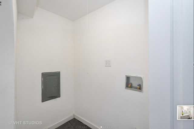 300 N State St Unit 3808, Chicago, IL 60654 - laundry room featuring washer hookup, electric panel, and dark tile patterned flooring