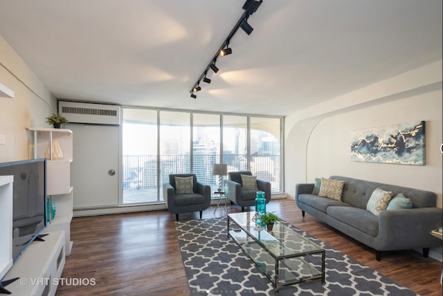 300 N State St Unit 3808, Chicago, IL 60654 - living area featuring rail lighting, a wall mounted air conditioner, dark wood finished floors, a baseboard heating unit, and a wall of windows
