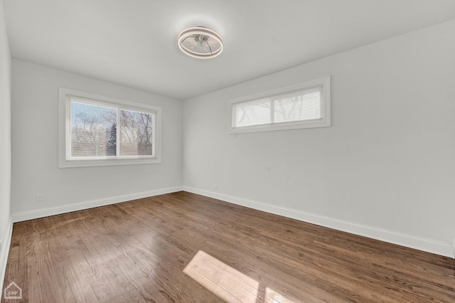 8559 S Drexel Ave, Chicago, IL 60619 - empty room with wood finished floors and baseboards