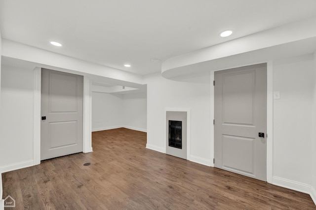 8559 S Drexel Ave, Chicago, IL 60619 - finished below grade area with a fireplace, wood finished floors, and recessed lighting