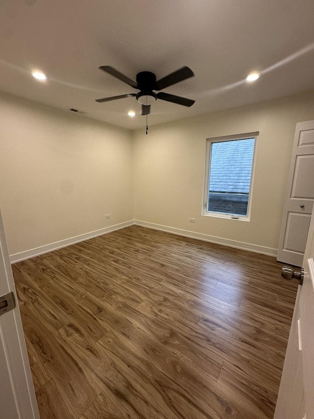 1325 S 50th Ct, Cicero, IL 60804 - unfurnished room featuring dark wood-style floors, a ceiling fan, and recessed lighting