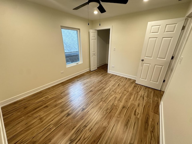 1325 S 50th Ct, Cicero, IL 60804 - unfurnished bedroom featuring wood finished floors, recessed lighting, and ceiling fan