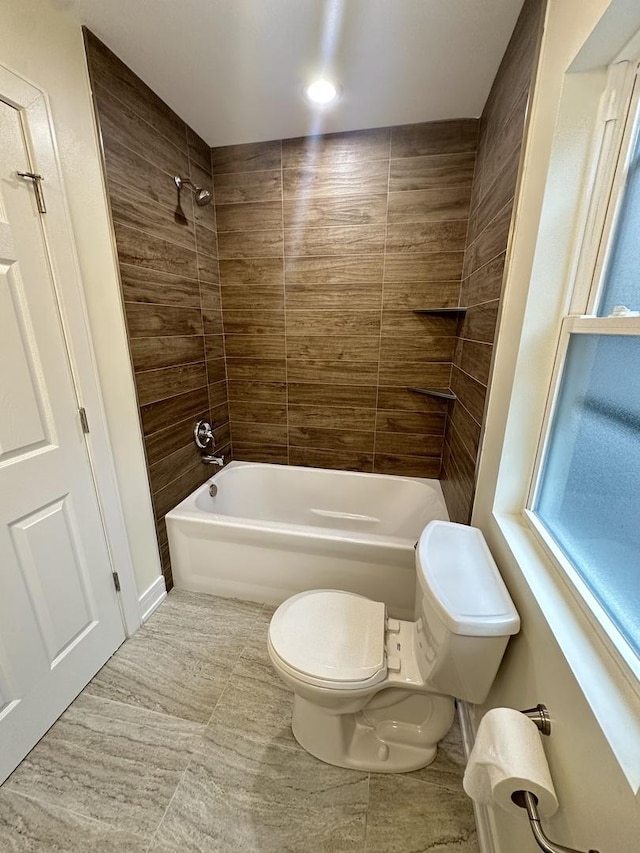 1325 S 50th Ct, Cicero, IL 60804 - bathroom featuring tub / shower combination and tile patterned flooring