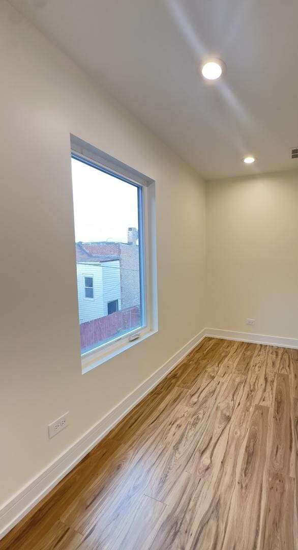 1325 S 50th Ct, Cicero, IL 60804 - unfurnished room featuring light wood-type flooring and recessed lighting
