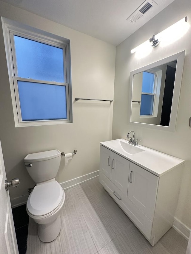 1325 S 50th Ct, Cicero, IL 60804 - half bath featuring baseboards and vanity