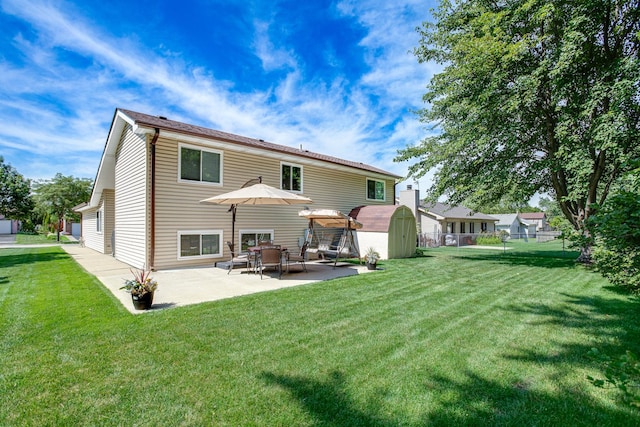 1380 Windjammer Ln, Hanover Park, IL 60133 - rear view of property with a shed and a patio