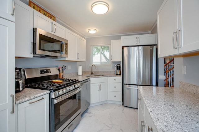 1380 Windjammer Ln, Hanover Park, IL 60133 - kitchen with stainless steel appliances, light marble finish flooring, white cabinetry, light stone counters, and ornamental molding