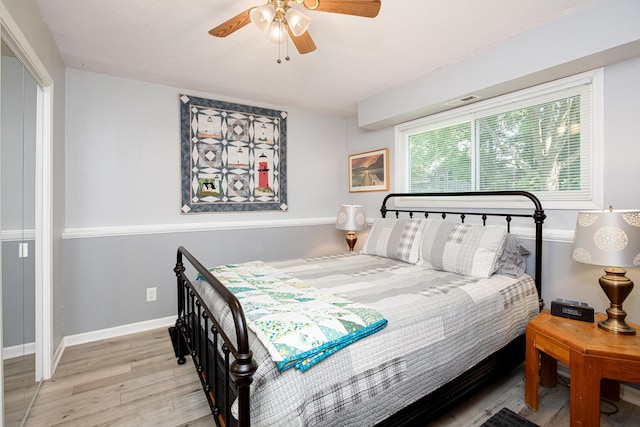 1380 Windjammer Ln, Hanover Park, IL 60133 - bedroom with wood finished floors and a ceiling fan
