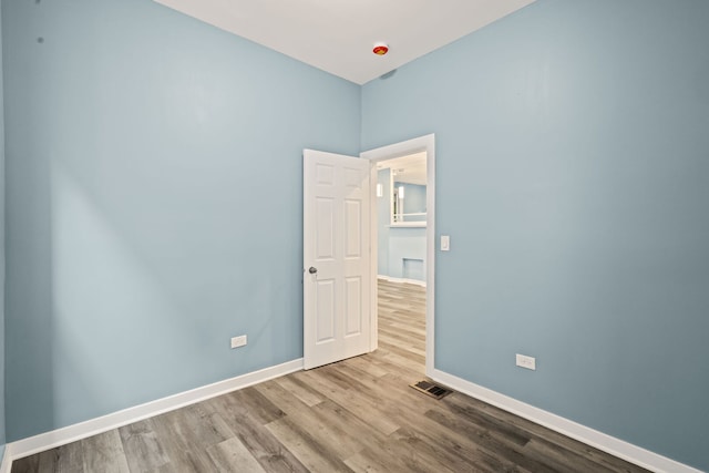 4025 W Adams St, Chicago, IL 60624 - spare room with wood finished floors and baseboards