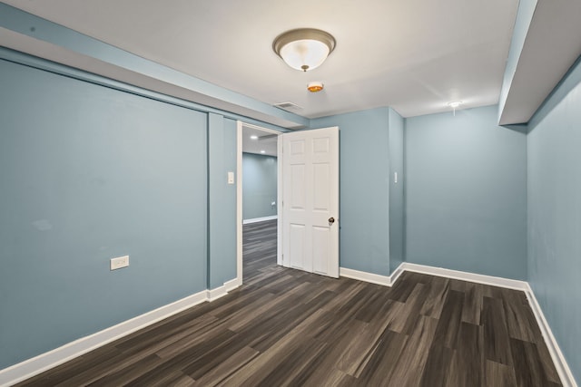 4025 W Adams St, Chicago, IL 60624 - unfurnished bedroom featuring dark wood-type flooring and baseboards