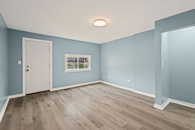 4025 W Adams St, Chicago, IL 60624 - foyer entrance with wood finished floors and baseboards