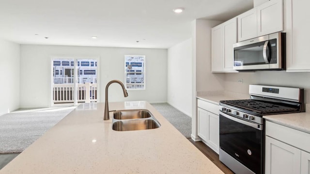 17319 Ulster Dr, Tinley Park, IL 60477 - kitchen with appliances with stainless steel finishes, white cabinetry, light stone countertops, and recessed lighting