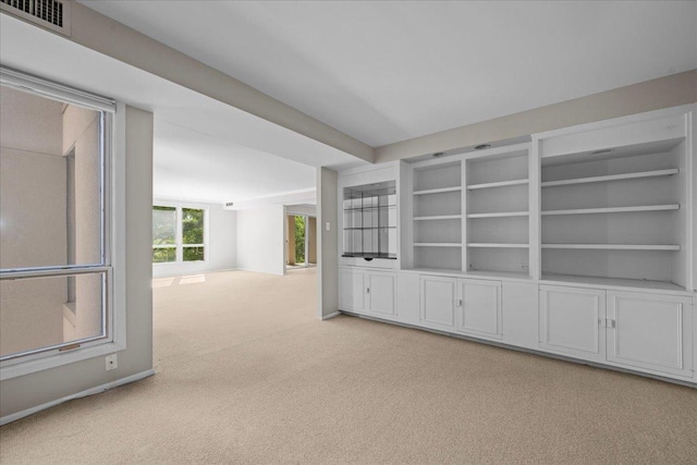 650 Winnetka Mews Unit 311, Winnetka, IL 60093 - spare room with light carpet and built in features