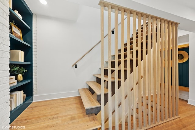 636 W Buckingham Pl Unit C, Chicago, IL 60657 - staircase featuring wood finished floors and recessed lighting