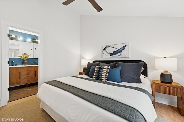 636 W Buckingham Pl Unit C, Chicago, IL 60657 - bedroom with connected bathroom, ceiling fan, and wood finished floors