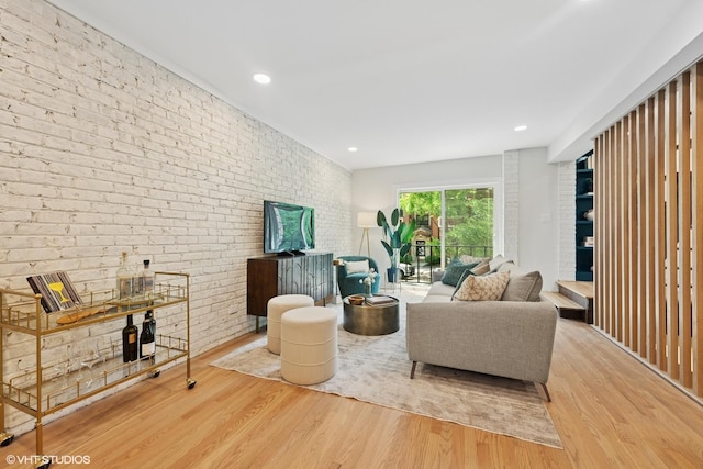 636 W Buckingham Pl Unit C, Chicago, IL 60657 - living area featuring wood finished floors, brick wall, and recessed lighting
