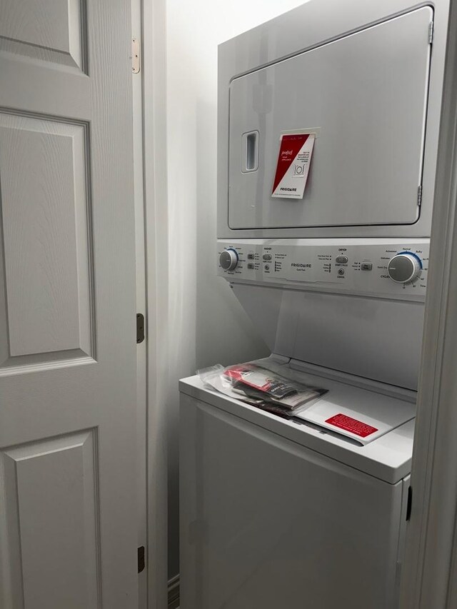 4256 W Augusta Blvd, Chicago, IL 60651 - laundry area featuring estacked washer and dryer