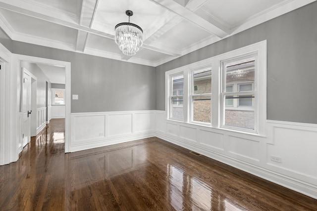 2107 E Ave, Berwyn, IL 60402 - empty room with coffered ceiling, a chandelier, beamed ceiling, dark wood finished floors, and a wainscoted wall