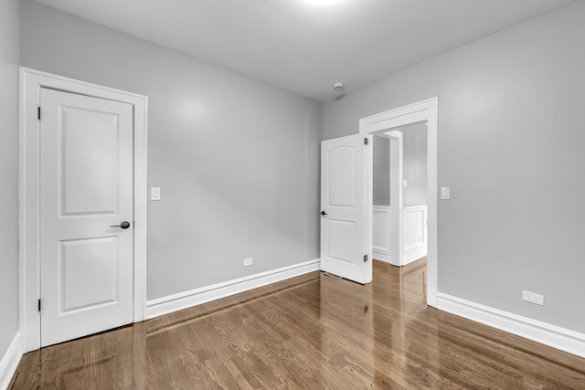2107 E Ave, Berwyn, IL 60402 - unfurnished bedroom with wood finished floors and baseboards