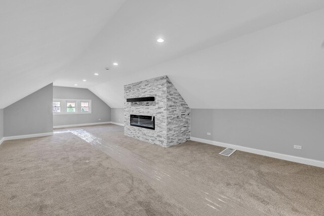 2107 E Ave, Berwyn, IL 60402 - unfurnished living room with lofted ceiling, carpet, a large fireplace, and recessed lighting