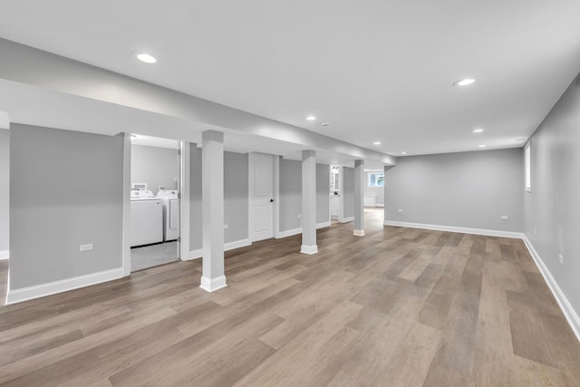 2107 E Ave, Berwyn, IL 60402 - basement featuring washer and clothes dryer, light wood finished floors, and recessed lighting