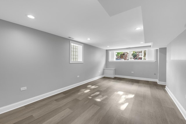 2107 E Ave, Berwyn, IL 60402 - basement with dark wood-style flooring, recessed lighting, and healthy amount of natural light
