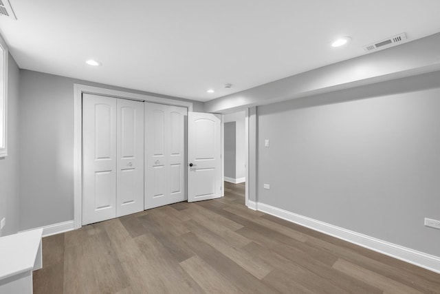 2107 E Ave, Berwyn, IL 60402 - unfurnished bedroom featuring wood finished floors, recessed lighting, and a closet