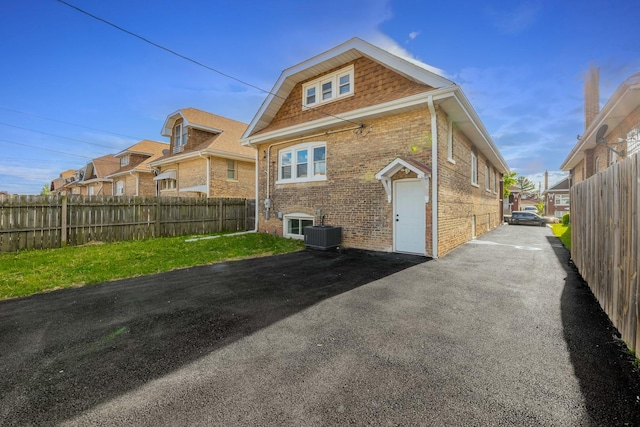 2107 E Ave, Berwyn, IL 60402 - rear view of house featuring brick siding