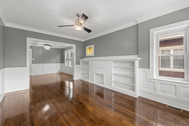 2107 E Ave, Berwyn, IL 60402 - unfurnished living room featuring wood finished floors, a chandelier, ornamental molding, wainscoting, and ceiling fan
