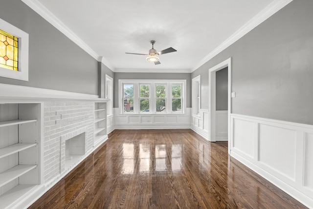 2107 E Ave, Berwyn, IL 60402 - unfurnished living room with ceiling fan, wood finished floors, crown molding, wainscoting, and a brick fireplace