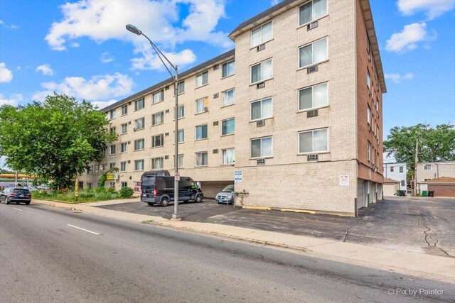 1227 S Harlem Ave Unit 514, Berwyn, IL 60402 - view of apartment building / complex with uncovered parking