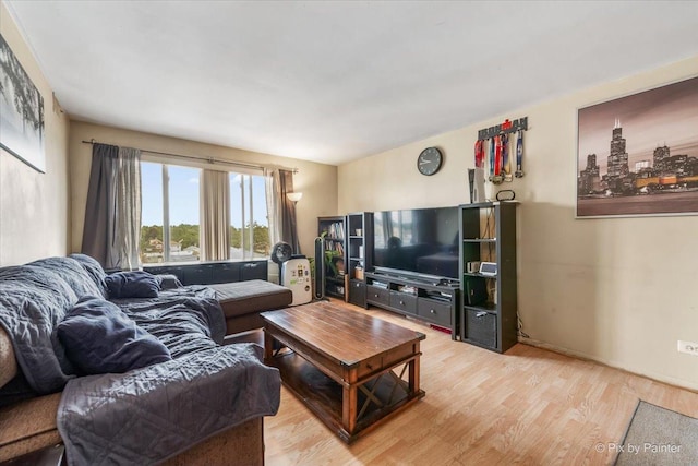 1227 S Harlem Ave Unit 514, Berwyn, IL 60402 - living area featuring light wood-style floors