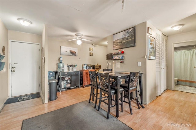 1227 S Harlem Ave Unit 514, Berwyn, IL 60402 - dining room featuring light wood finished floors and a ceiling fan