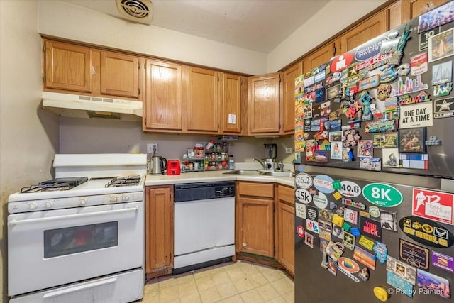 1227 S Harlem Ave Unit 514, Berwyn, IL 60402 - kitchen with white appliances, under cabinet range hood, light countertops, and brown cabinets
