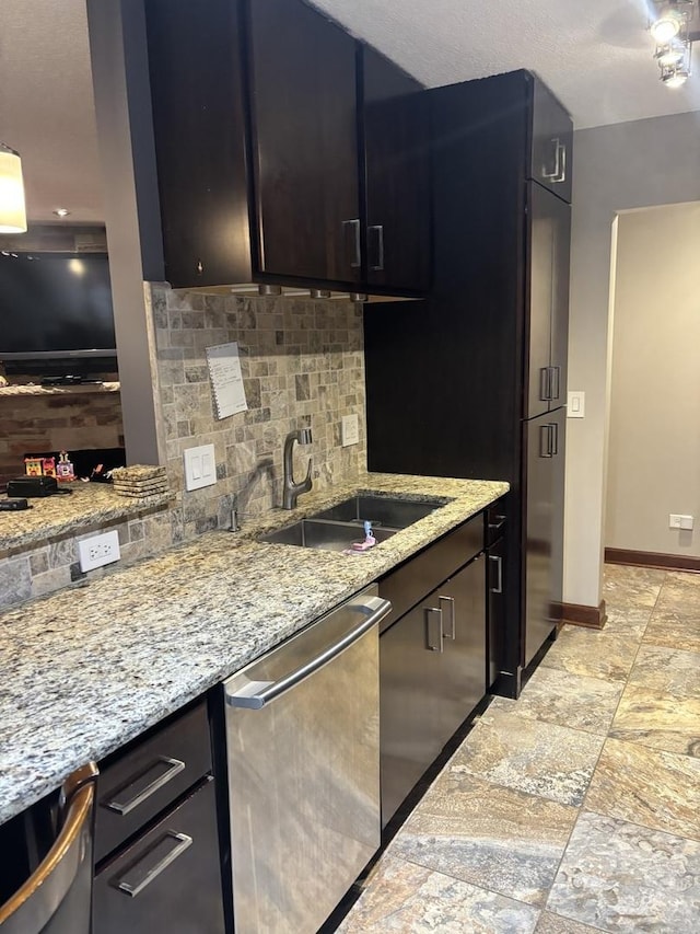 1017 Buccaneer Dr Unit 5, Schaumburg, IL 60173 - kitchen featuring stainless steel dishwasher, decorative backsplash, light stone countertops, and light stone finish floors