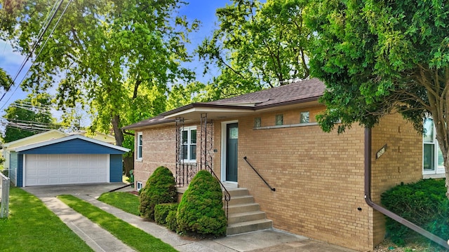 10012 S 52nd Ave, Oak Lawn, IL 60453 - ranch-style house with an outbuilding, a garage, brick siding, and roof with shingles
