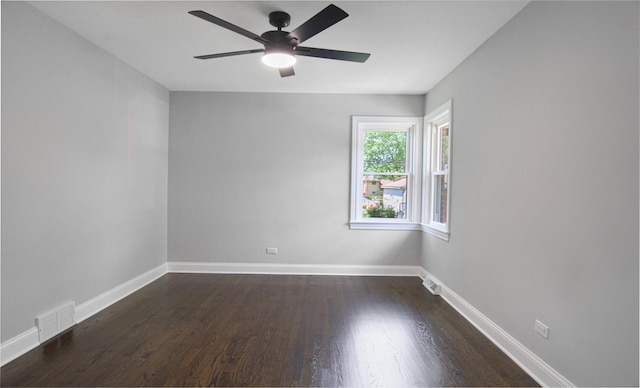 10012 S 52nd Ave, Oak Lawn, IL 60453 - spare room featuring dark wood-style flooring and ceiling fan