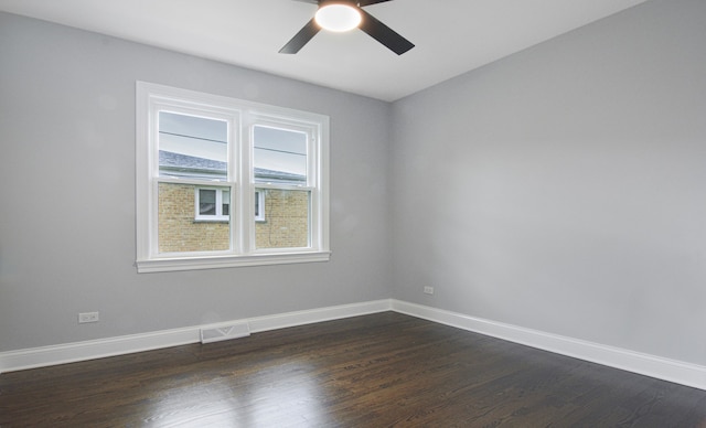 10012 S 52nd Ave, Oak Lawn, IL 60453 - unfurnished room featuring dark wood-style flooring and ceiling fan