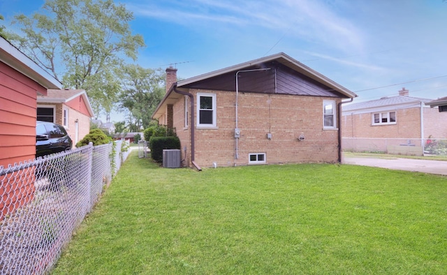 10012 S 52nd Ave, Oak Lawn, IL 60453 - view of property exterior with a chimney and brick siding