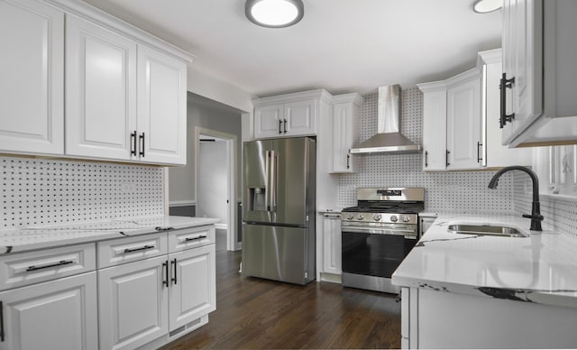 10012 S 52nd Ave, Oak Lawn, IL 60453 - kitchen featuring appliances with stainless steel finishes, wall chimney range hood, tasteful backsplash, and white cabinets