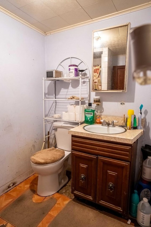 4830 W Oakdale Ave, Chicago, IL 60641 - bathroom featuring vanity and ornamental molding