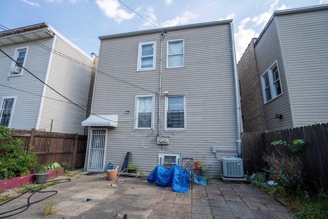 4830 W Oakdale Ave, Chicago, IL 60641 - back of house featuring a patio and a fenced backyard